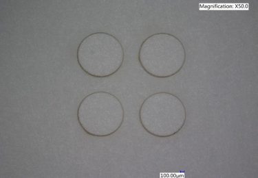 Micromachining of thermally sensitive PET film