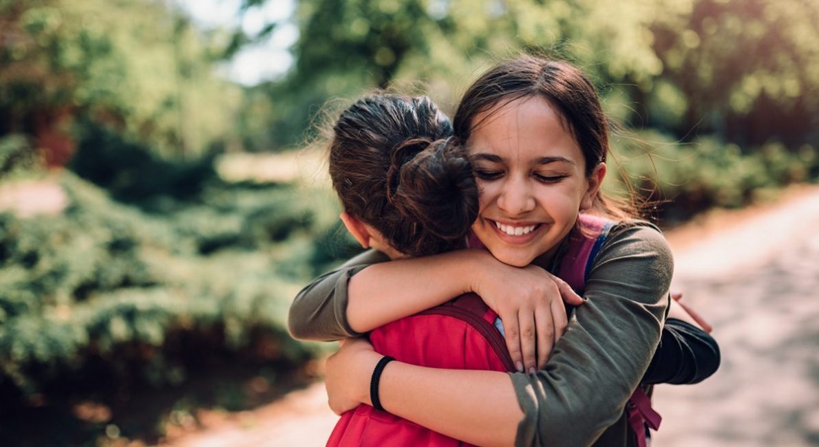 Girls hugging